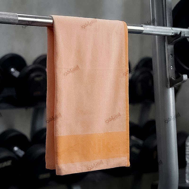 خرید حوله ورزشی نایک نارنجی؛ جذب آب بالا و خشک شدن سریع | اسپاکو